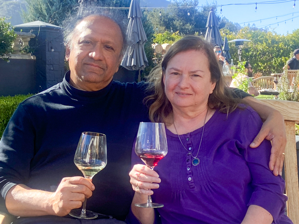 Photo of S. T. and Mary sitting outdoors at a winery