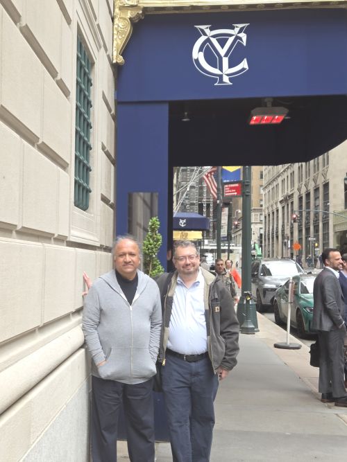 S. T. and Gabriel Mesa outside the Yale Club