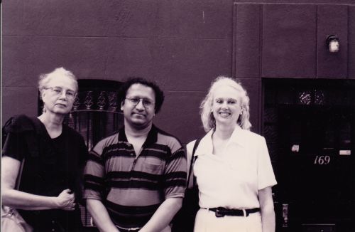 Photo of Mara Kirk Hart (right), her sister (left), and S. T. Joshi in front of 169 Clinton Street, Brooklyn.