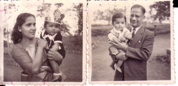 Mother and Father Holding S. T. as a baby