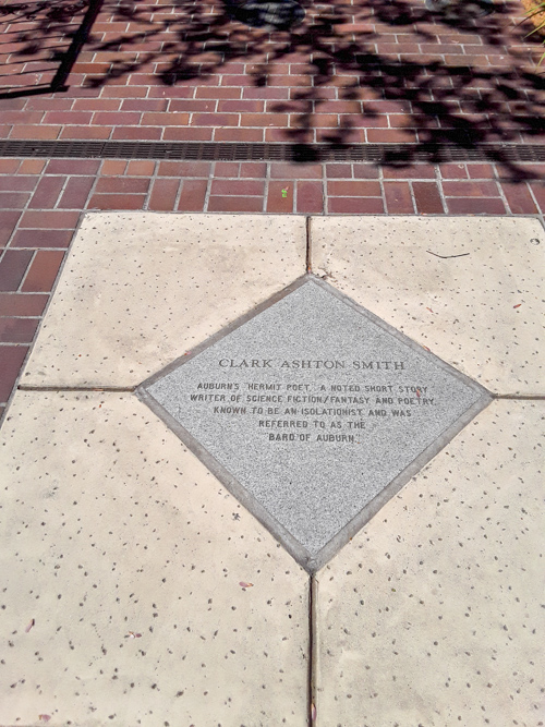 Sidewalk plaque commemorating Clark Ashton Smith