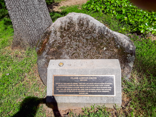 Plaque commemorating Clark Ashton Smith and the stone where his ashes were buried