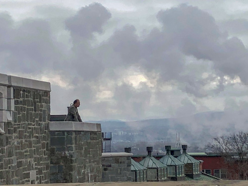 Photo of S. T. on the parapet of St. John's Gate, Quebec